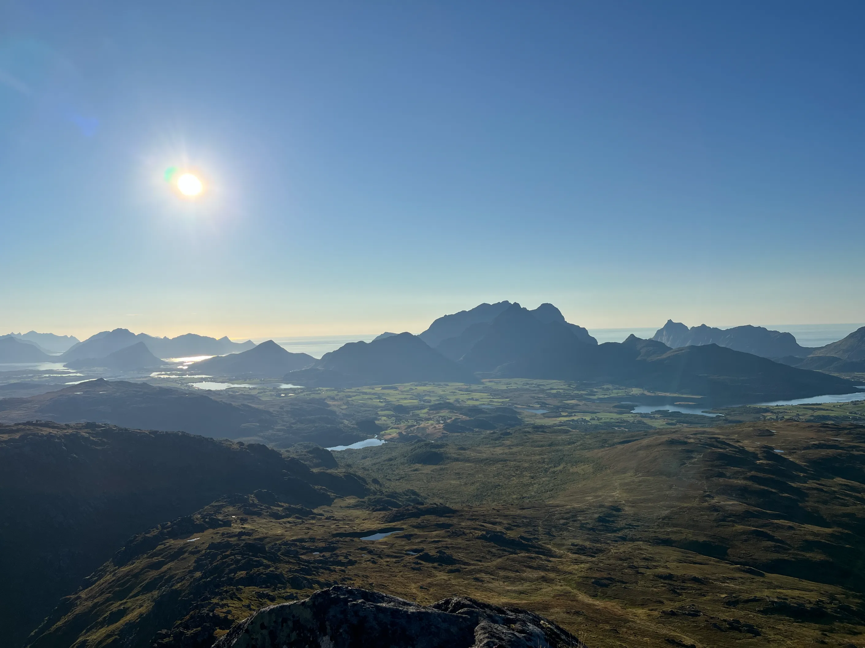 Wide landscape view from Blåtinden showing the Norwegian Sea