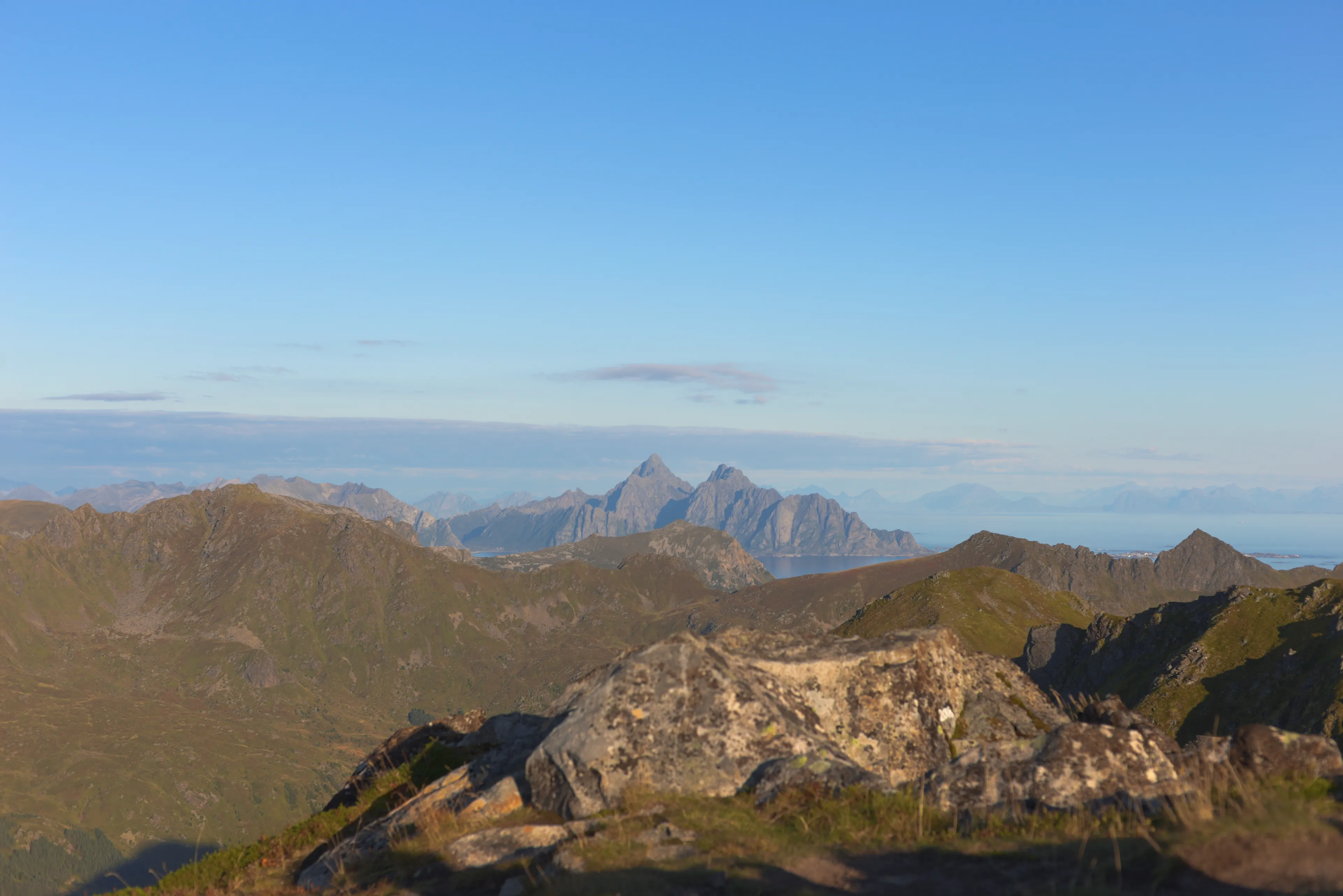 Blåtinden peak with surrounding mountain ranges